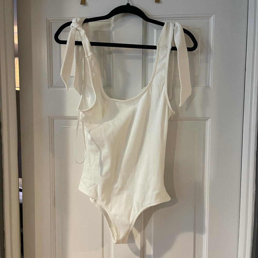Brand new tie shoulder bodysuit
